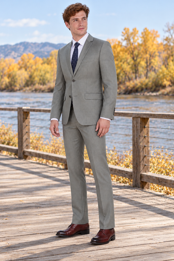 Renoir Men’s Slim Fit Light Grey 2 Piece Suit — model photograph in a wide wooden boardwalk by an autumn river, distant golden cottonwood trees, no wedding decorations