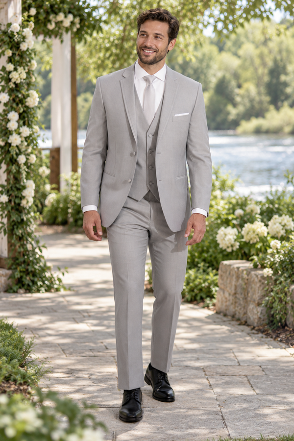 "The Lennox" Men's Slim Fit Light Grey 3 Piece Tuxedo shown in professional outdoor wedding photography