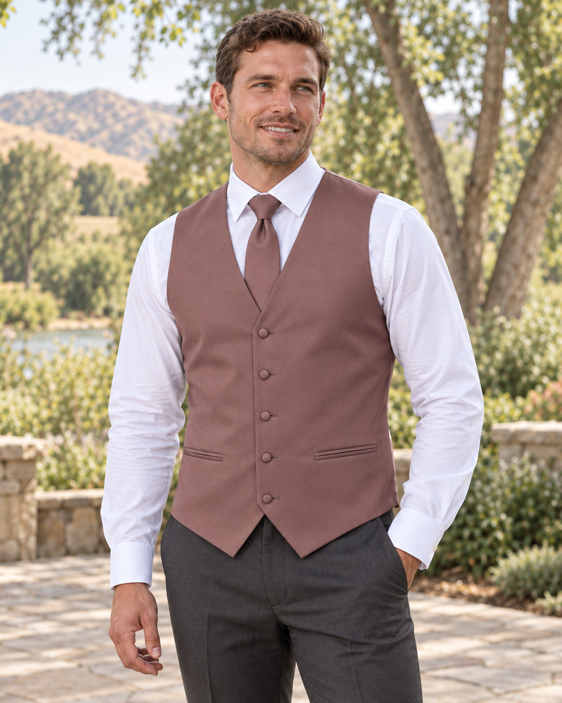 Dark Mauve satin vest with coordinating necktie on a model in an outdoor Idaho wedding setting